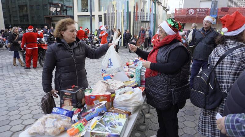 Revving up for Christmas! Santas on bikes help those in need